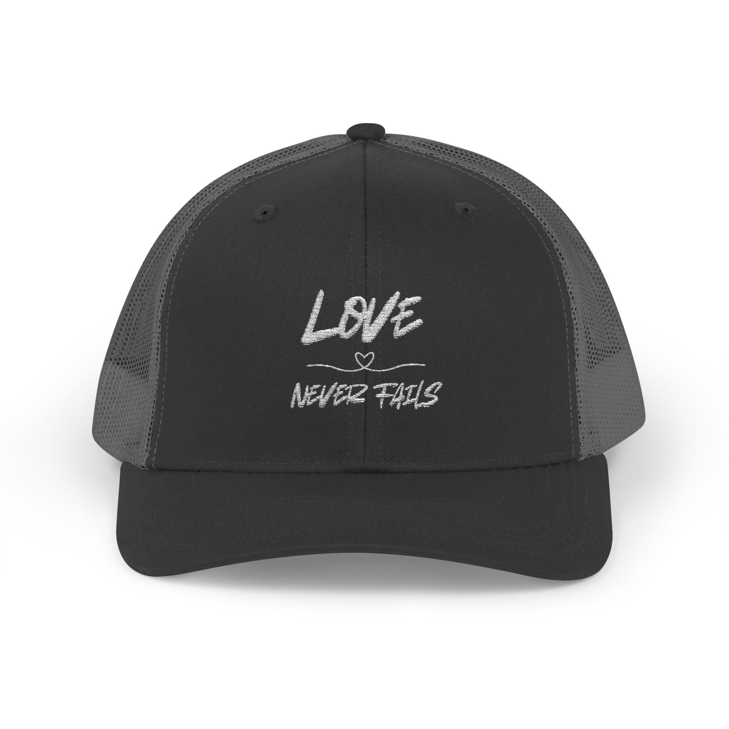 LOVE NEVER FAILS TRUCKER HAT