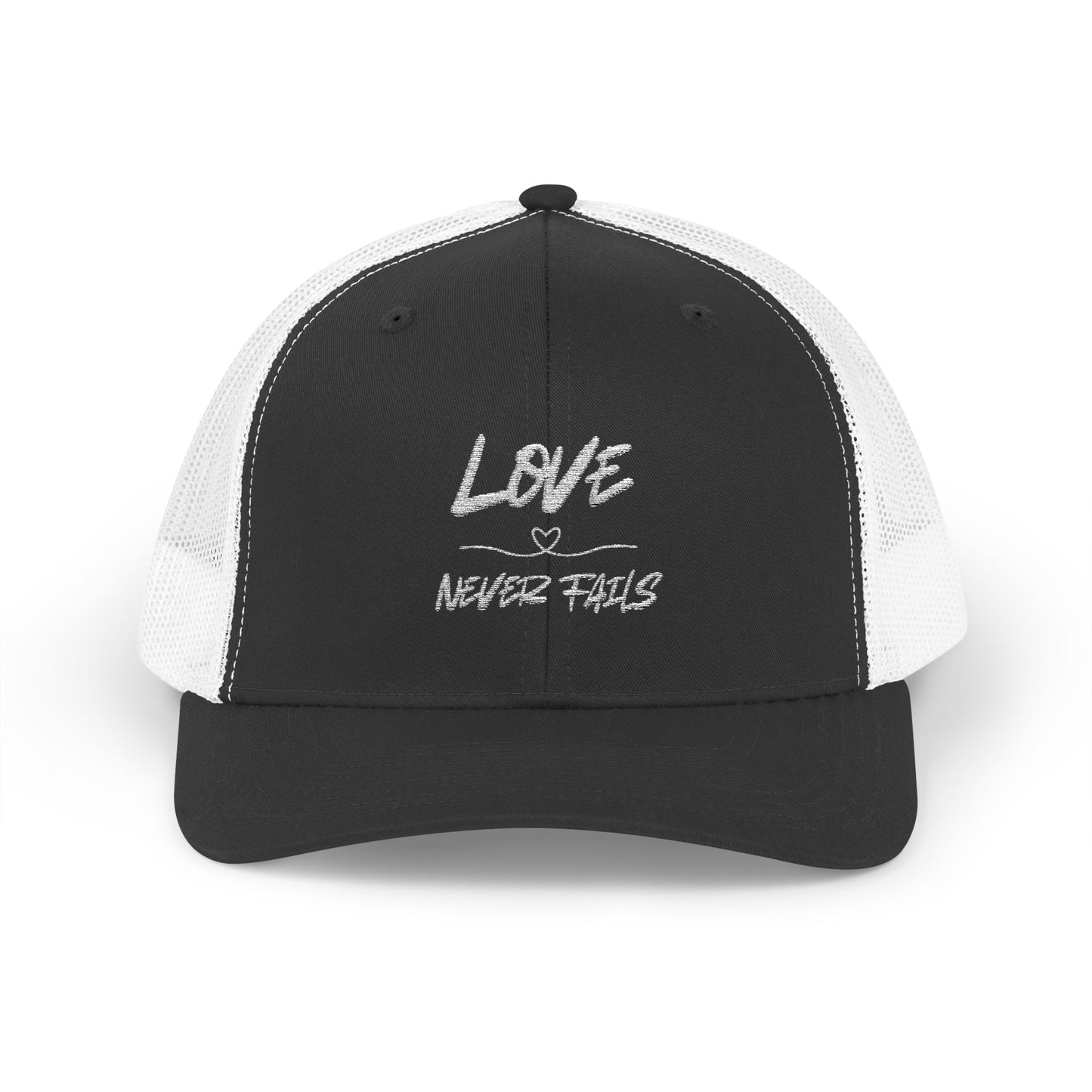 LOVE NEVER FAILS TRUCKER HAT