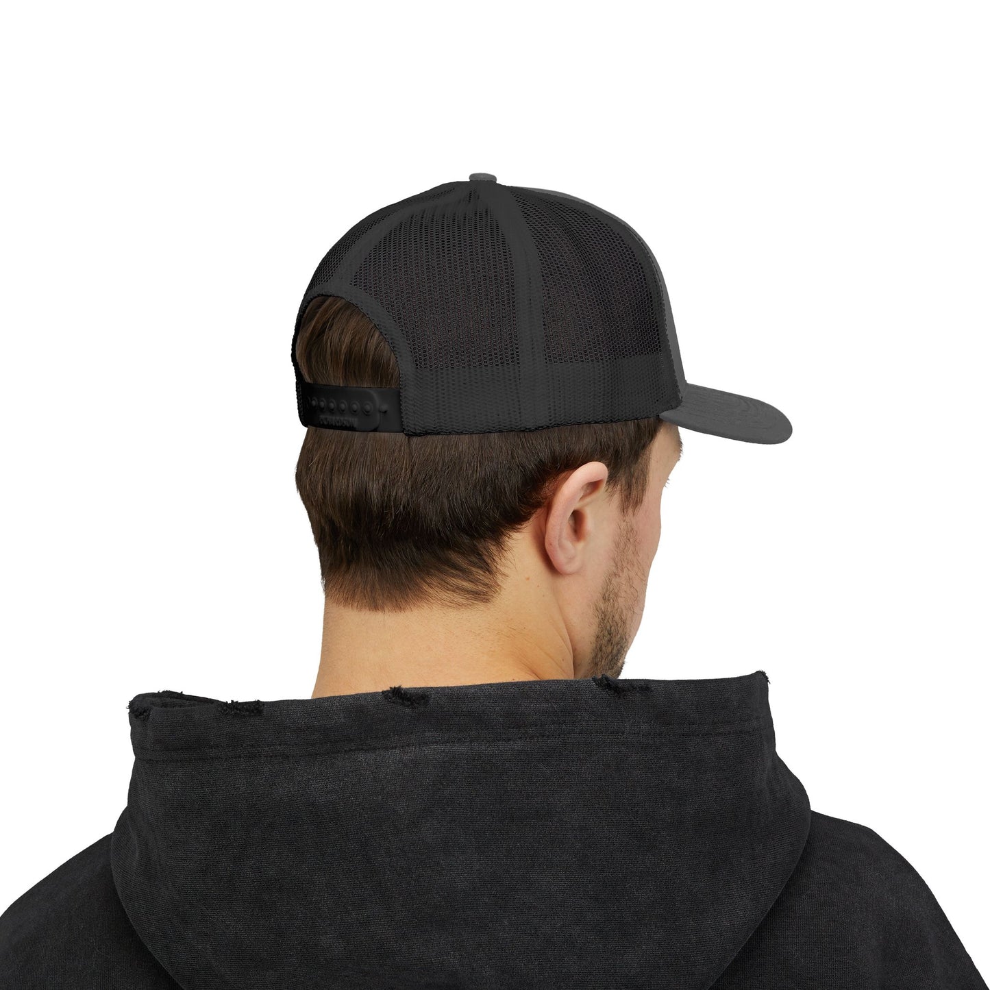 LOVE NEVER FAILS TRUCKER HAT