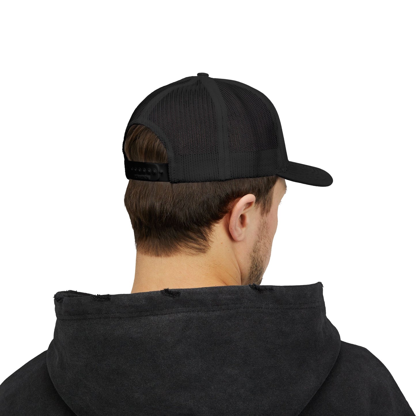 LOVE NEVER FAILS TRUCKER HAT