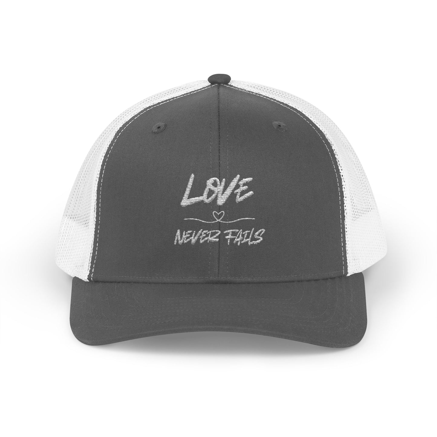 LOVE NEVER FAILS TRUCKER HAT