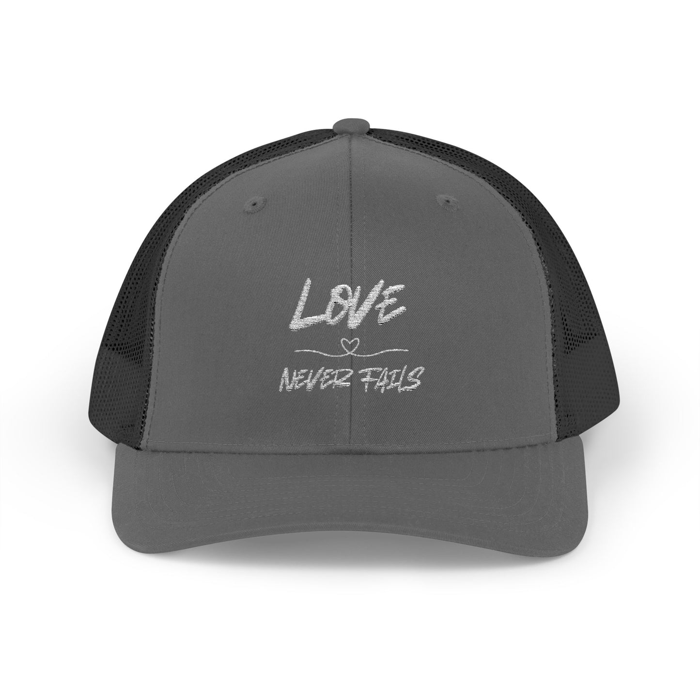 LOVE NEVER FAILS TRUCKER HAT