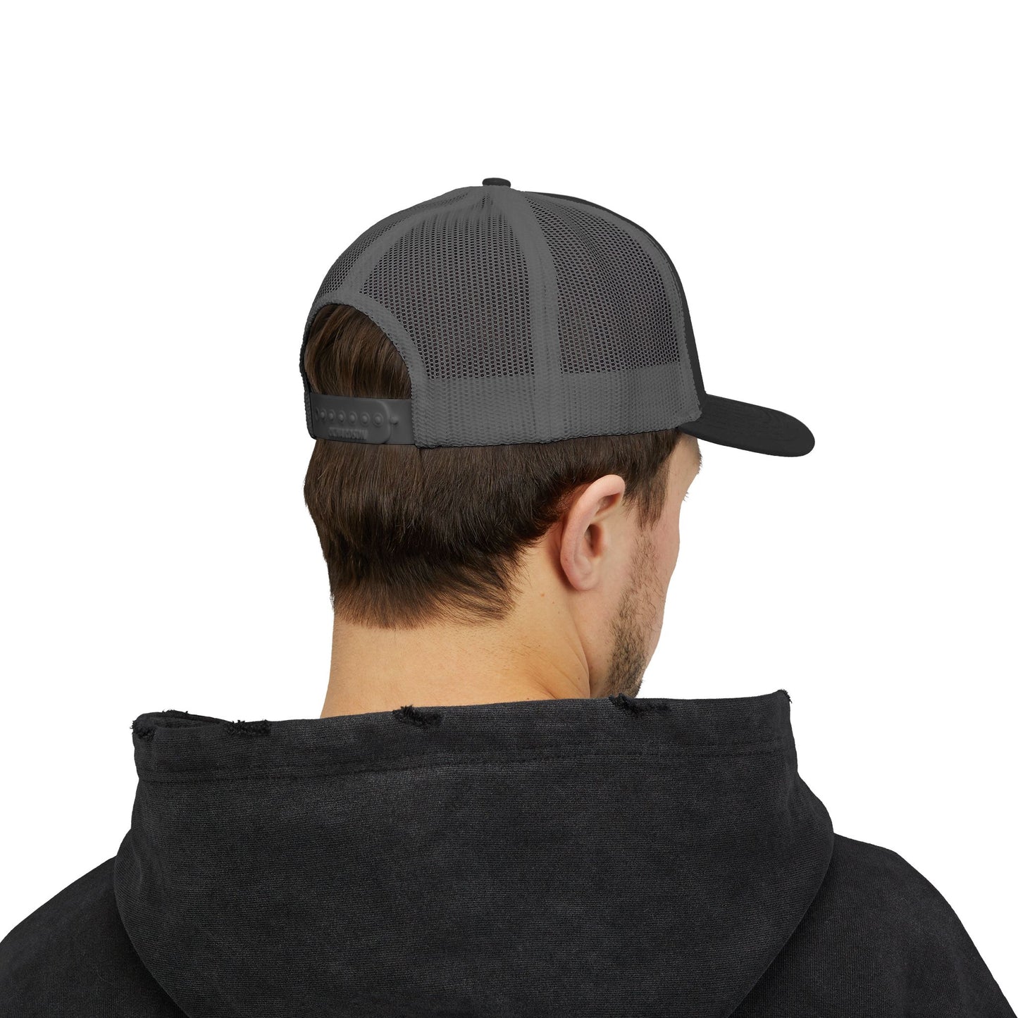 LOVE NEVER FAILS TRUCKER HAT